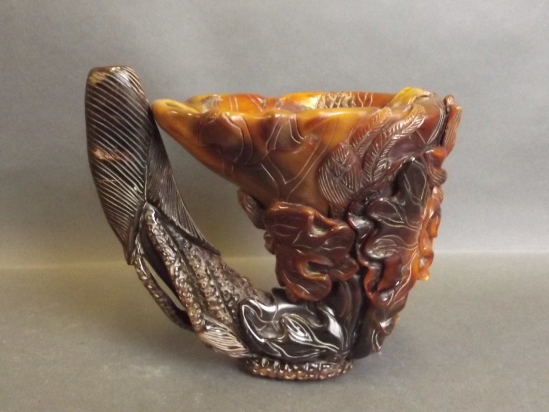 A Chinese carved horn libation cup with lotus flowers (1 of 1)