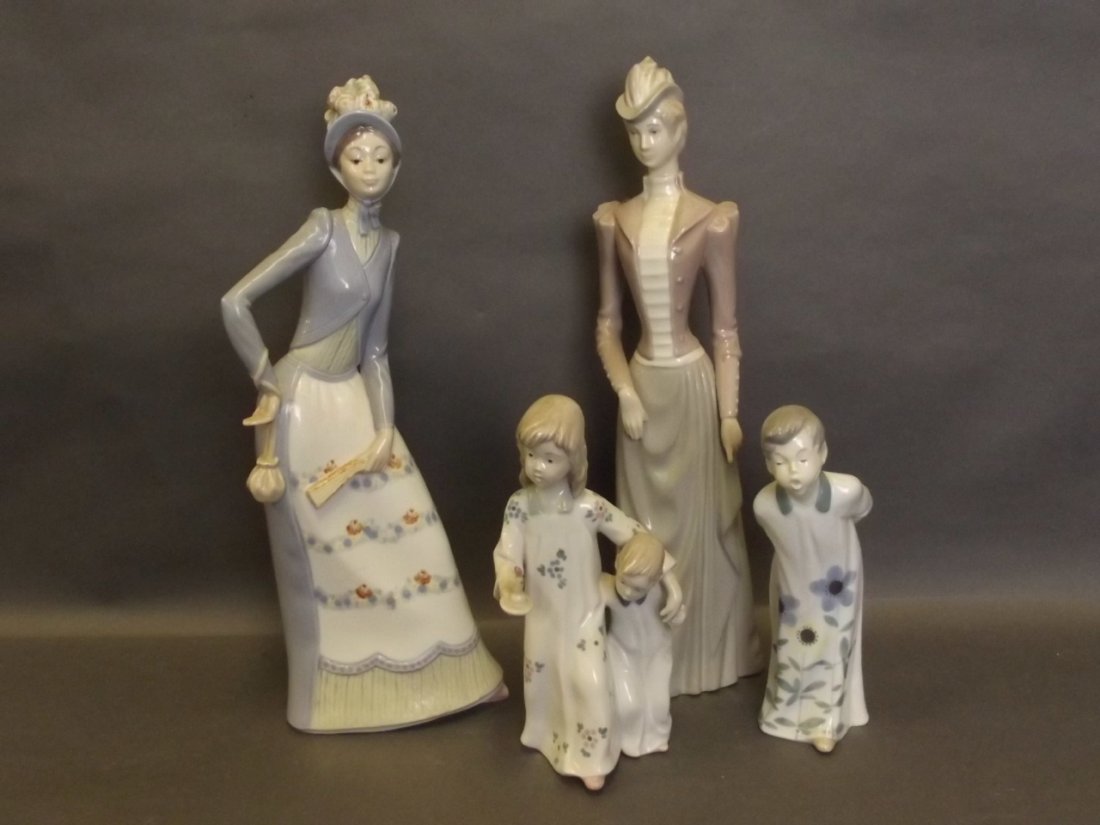 A Zaphir figure of a lady in a blue hat, a similar (1 of 1)