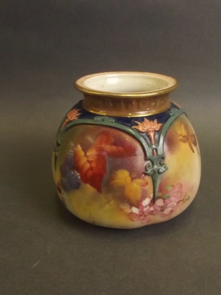 A Worcester porcelain vase with painted leaf and berry: A Worcester porcelain vase with painted leaf and berry decoration, monogrammed 'JH' to base, 3'' high (AF repair to rim)