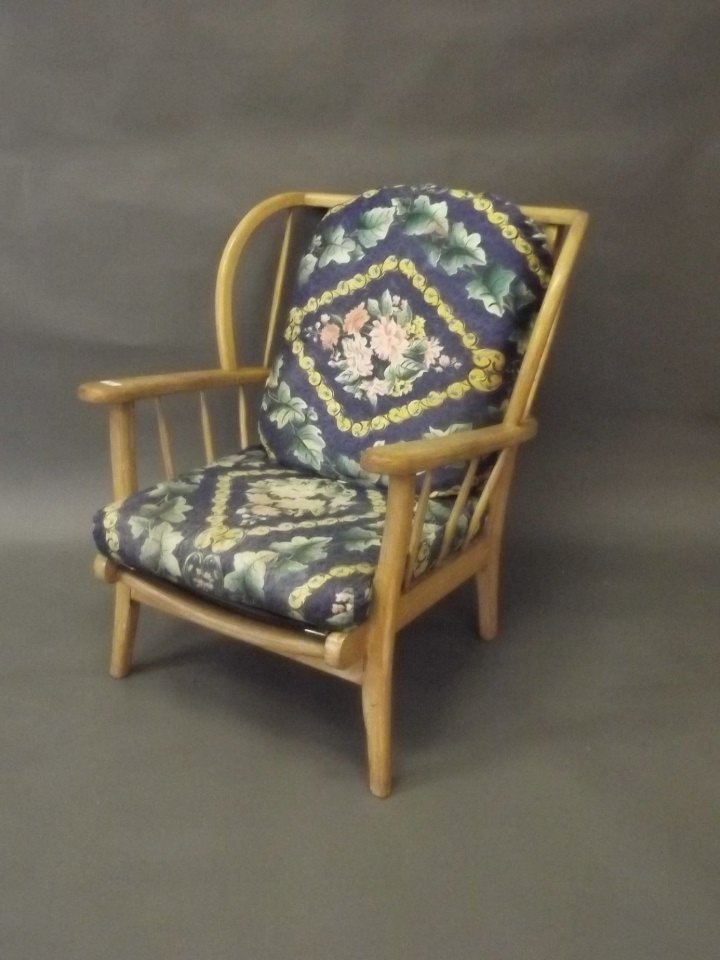 An Ercol beechwood hoop back armchair: An Ercol beechwood hoop back armchair