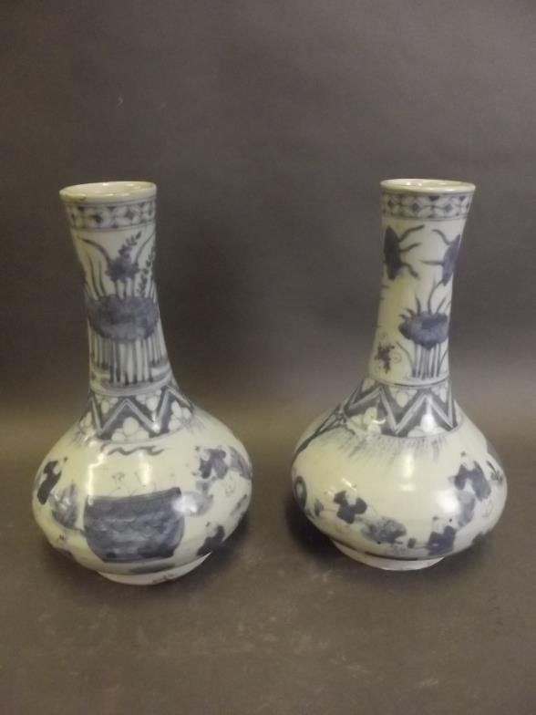 A pair of C19th Chinese blue and white vases with: A pair of C19th Chinese blue and white vases with painted decoration of boys playing in a garden, 8Â½'' high