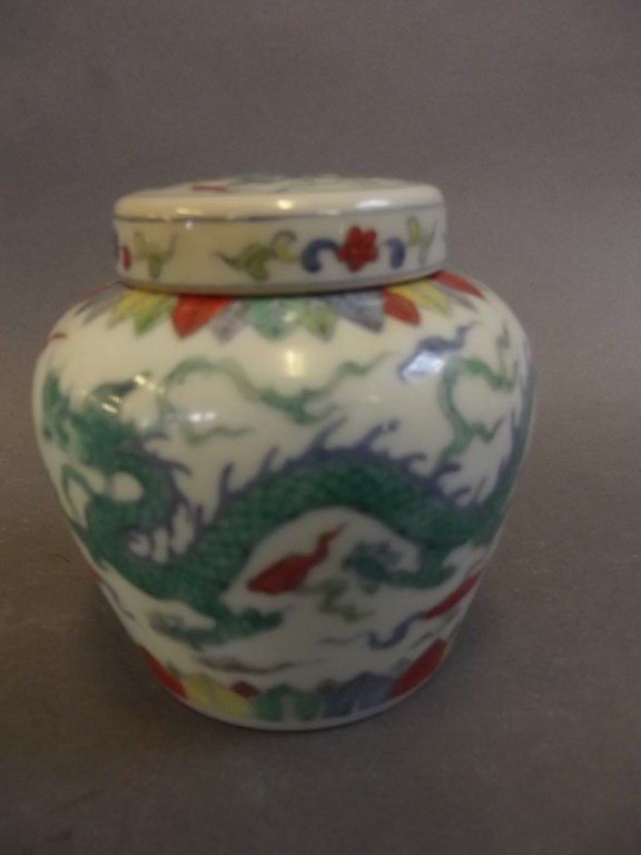 A Chinese Doucai porcelain jar and cover decorated with (1 of 3)