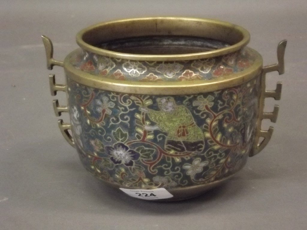 A Chinese cloisonnÃ© twin handled jardiniÃ¨re with: A Chinese cloisonnÃ© twin handled jardiniÃ¨re with phoenix and scrolling decoration on a blue ground, signed to base, 5" high
