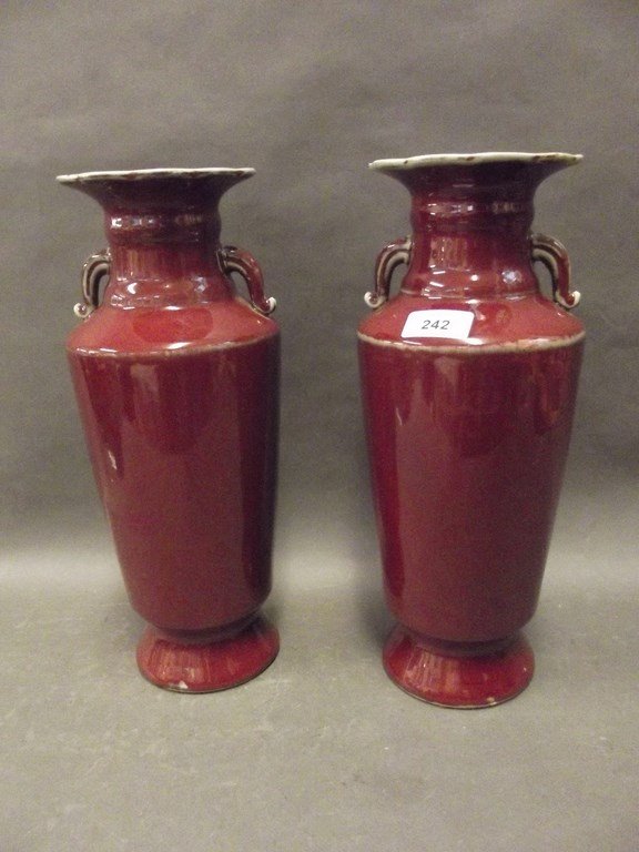 A pair of red glazed Oriental porcelain twin handled (1 of 1)