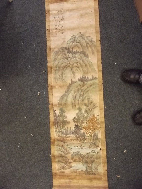 A Chinese silk scroll decorated with a landscape and (1 of 3)