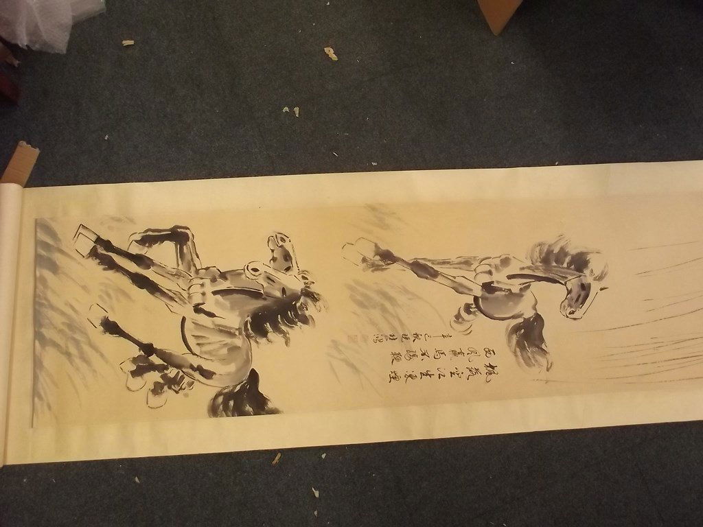 An Oriental scroll decorated with running horses, (1 of 4)