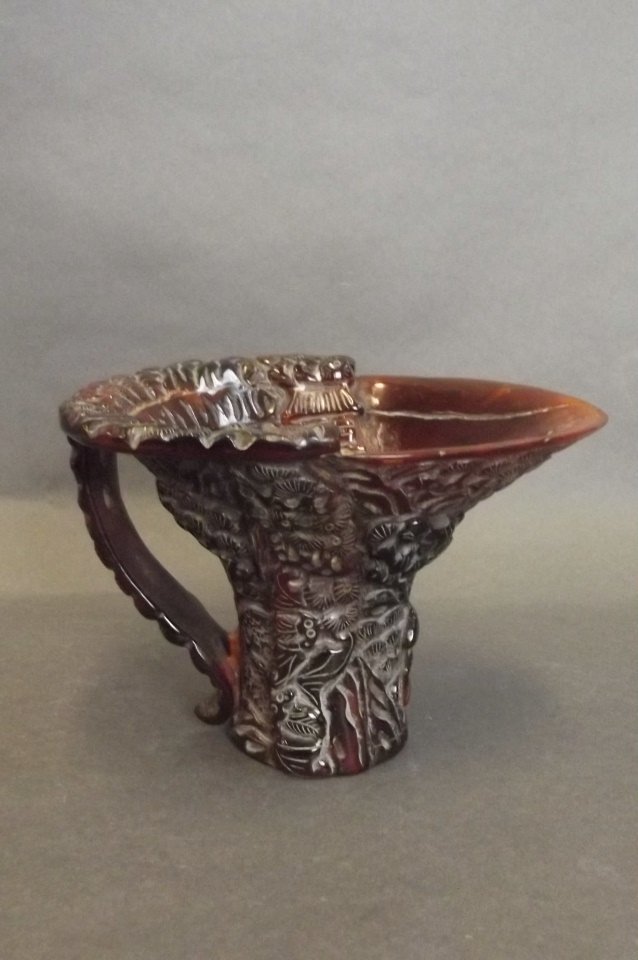 A Chinese horn libation cup with carved landscape (1 of 2)