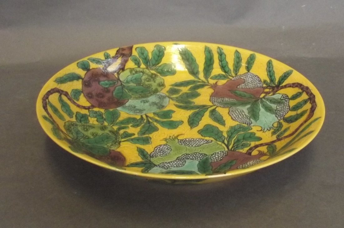 A Chinese yellow ground porcelain dish with incised (1 of 4)