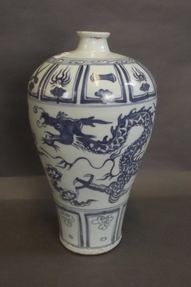 A C19th Chinese blue and white porcelain meiping vase: A C19th Chinese blue and white porcelain meiping vase with painted dragon decoration, 13" high