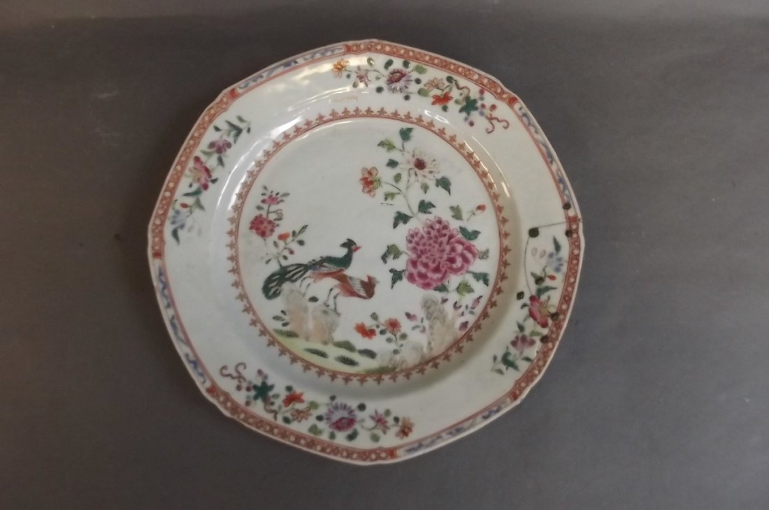 A C19th Chinese famille rose porcelain plate decorated: A C19th Chinese famille rose porcelain plate decorated with exotic birds and flowers, 9" diameter (AF)