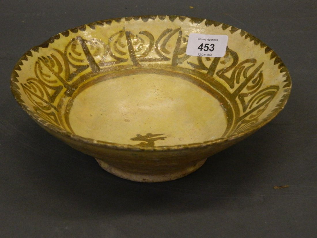 A Middle Eastern glazed terracotta bowl with stylised (1 of 3)