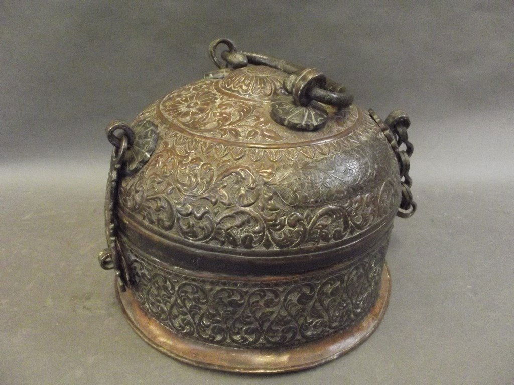A Middle Eastern copper lidded casket with repouss (1 of 1)