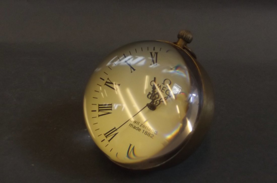 A brass bound ball desk clock, 3" diameter (1 of 2)