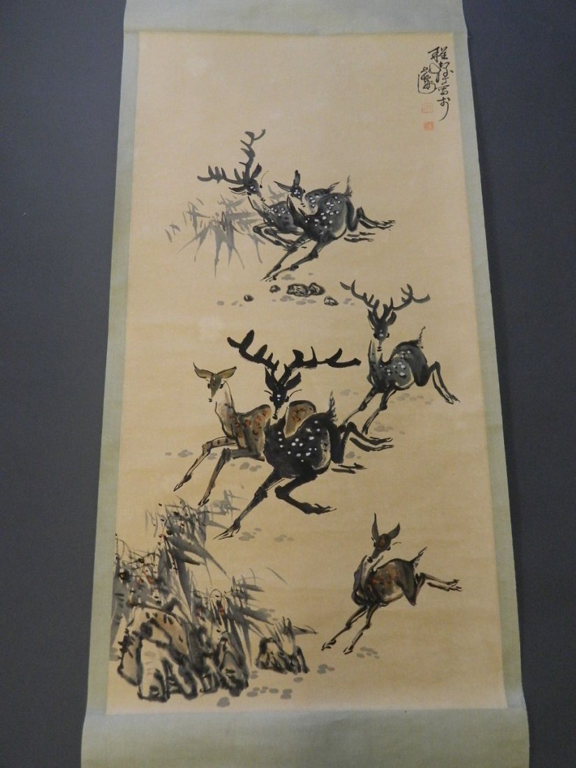 A Chinese watercolour scroll depicting deer and stags,: A Chinese watercolour scroll depicting deer and stags, 25" x 51"