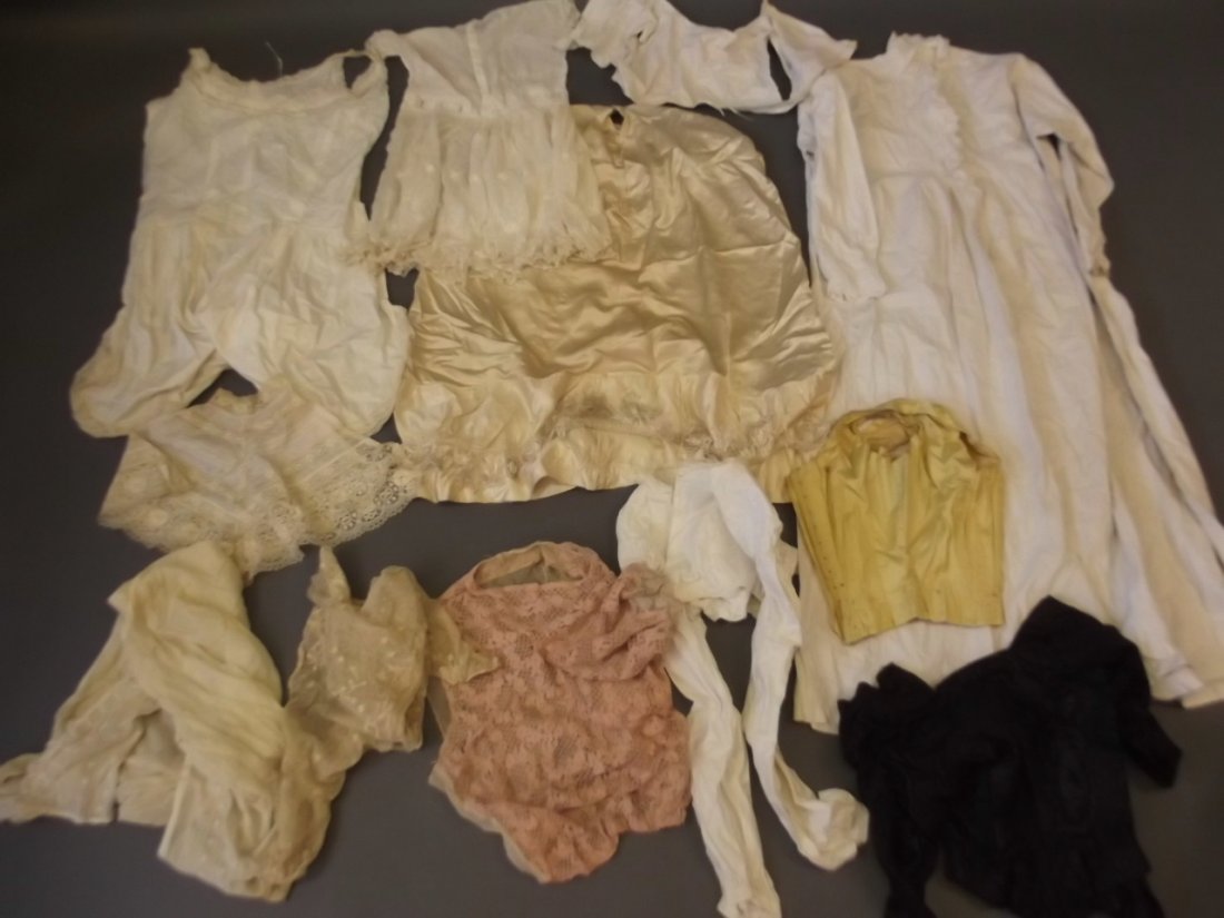 A quantity of Victorian clothing to include silk: A quantity of Victorian clothing to include silk blouses, two bodices, nightdress etc