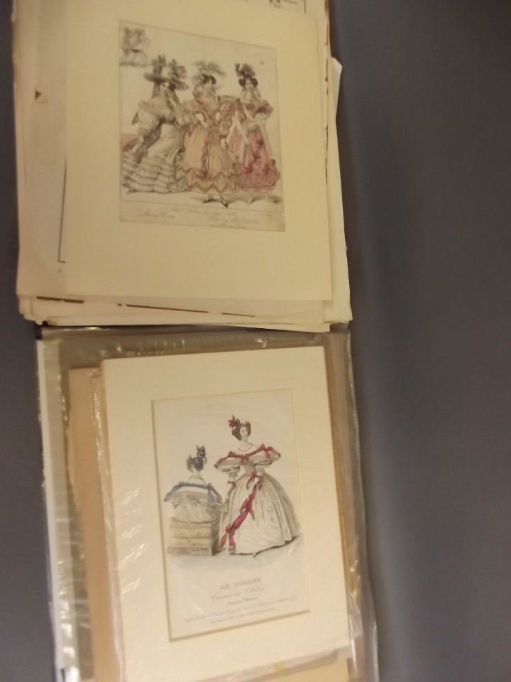 A large folio of fashion engravings from the C19th and: A large folio of fashion engravings from the C19th and C20th