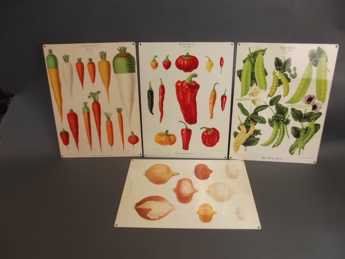 A set of four metal advertising signs decorated with (1 of 1)