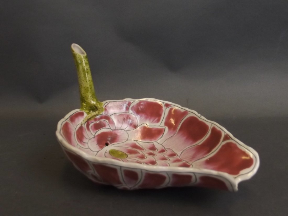 A Chinese enamelled porcelain bowl in the form of a: A Chinese enamelled porcelain bowl in the form of a lotus flower, character inscription to handle, 6" long
