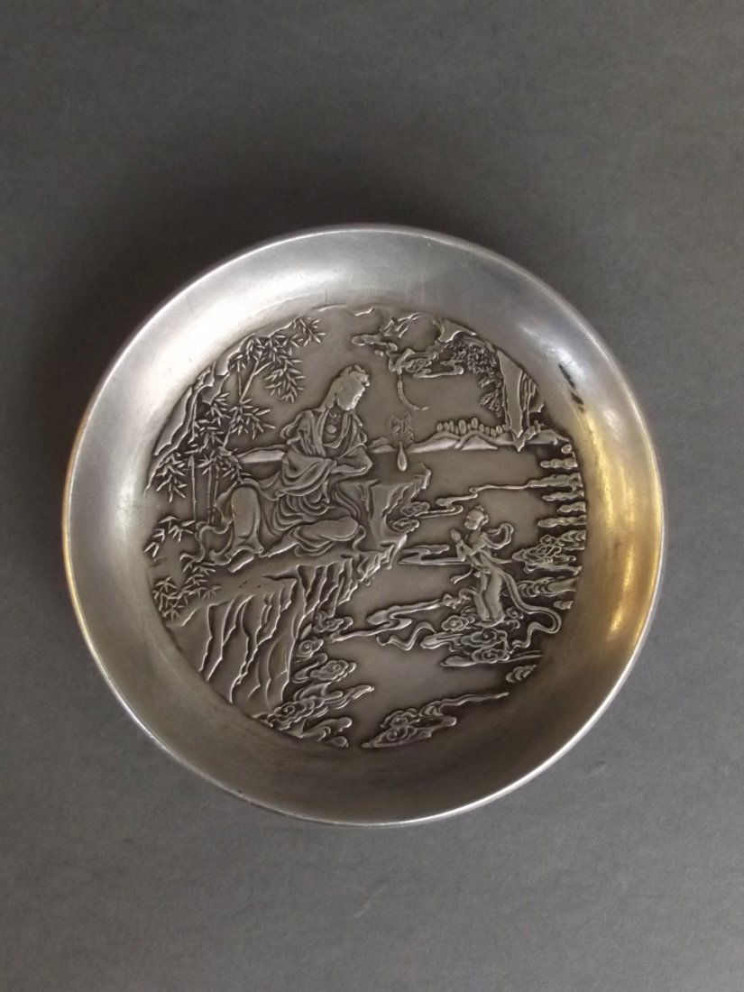 A Chinese silvered metal trinket dish with relief (1 of 2)