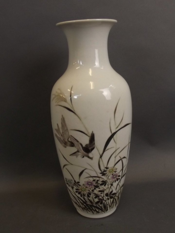 A Chinese porcelain baluster vase with hand painted: A Chinese porcelain baluster vase with hand painted decoration of birds and blossoms, calligraphy verso, red seal mark to base, 10" high