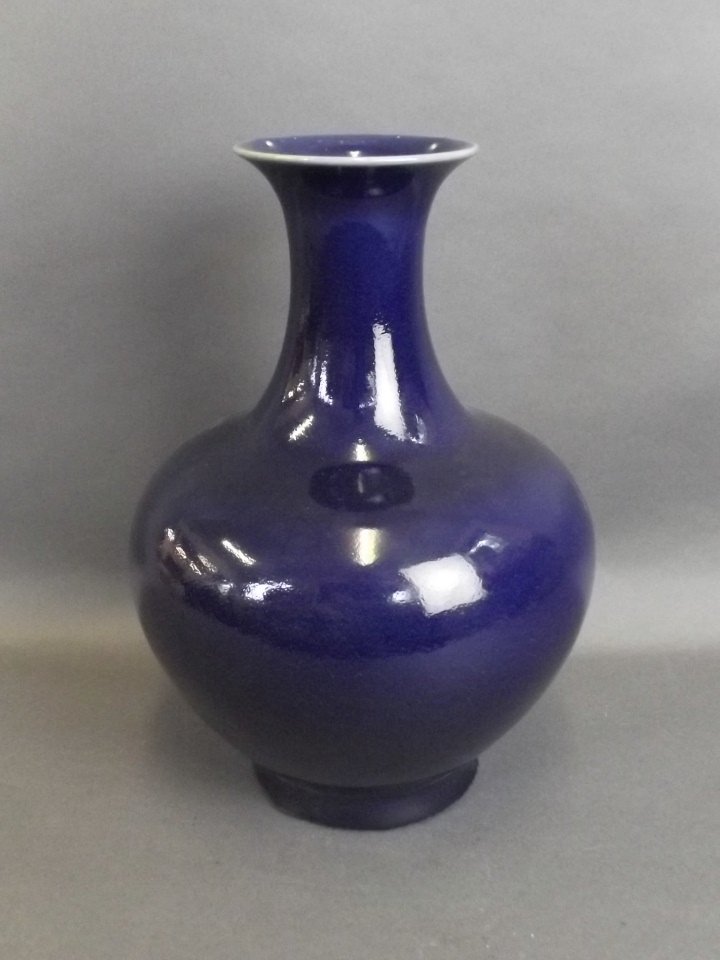 A Chinese blue ground porcelain vase, 6 character mark: A Chinese blue ground porcelain vase, 6 character mark to base, 12" high