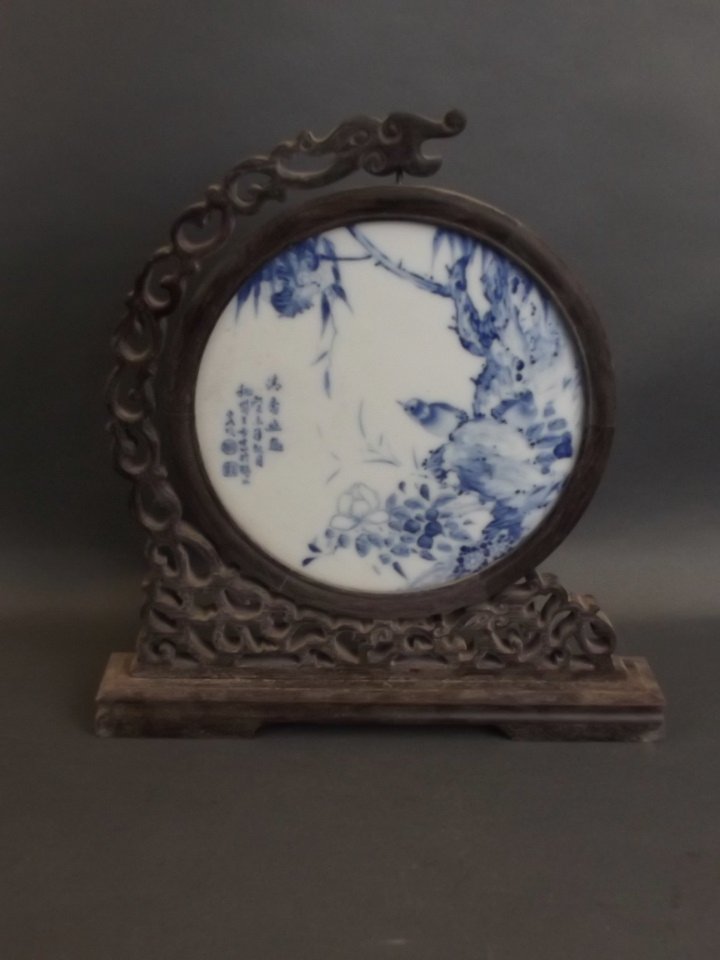 A Chinese blue and white circular porcelain table (1 of 2)