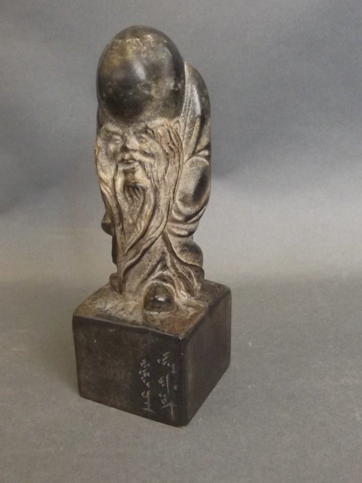 A Chinese soapstone seal with carved Lohan knop, 5": A Chinese soapstone seal with carved Lohan knop, 5" high