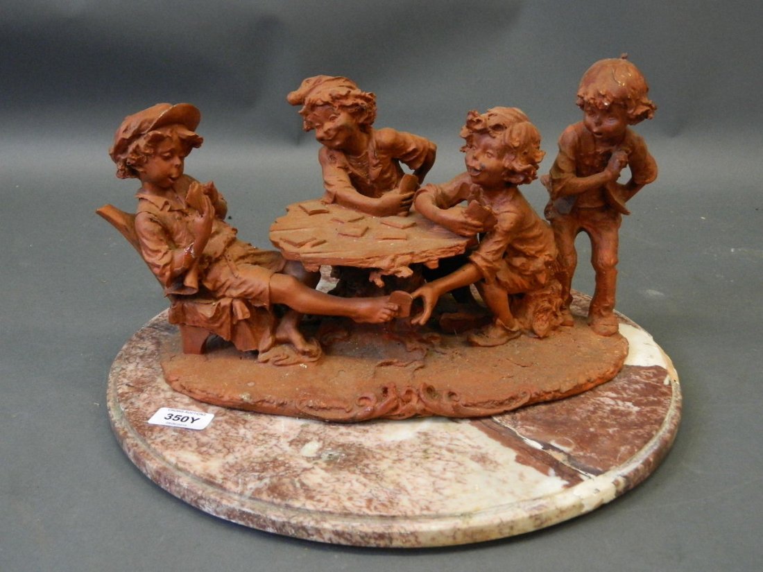 A composition model of pixies playing cards, mounted on (1 of 1)