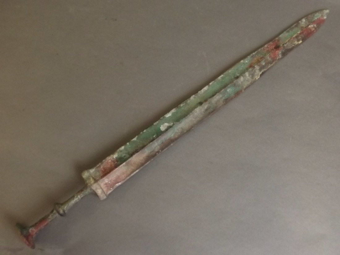 A patinated bronze short sword, blade 17" long: A patinated bronze short sword, blade 17" long