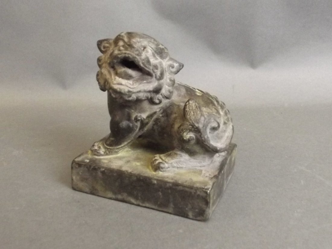 A Chinese bronze seal with Fo dog surmount, 3" x 2",: A Chinese bronze seal with Fo dog surmount, 3" x 2", 4" high