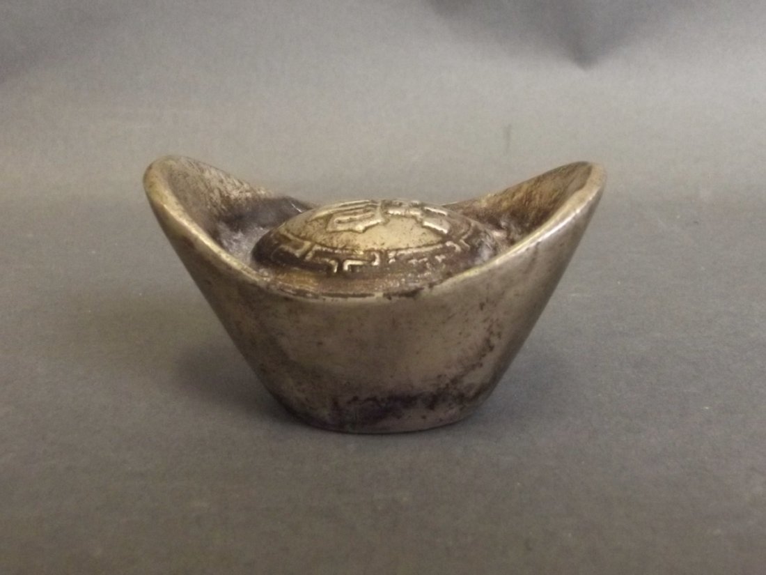 A Chinese white metal trade token, 4 character mark to: A Chinese white metal trade token, 4 character mark to base, 2" long