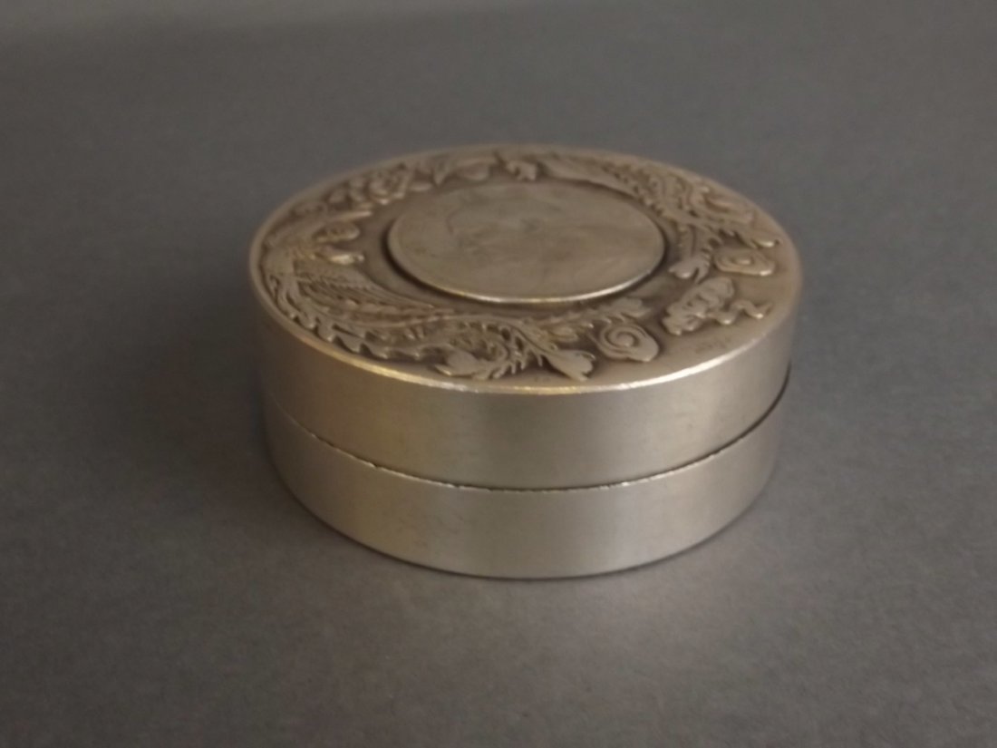A Chinese white metal coin pot with twin phoenix (1 of 4)