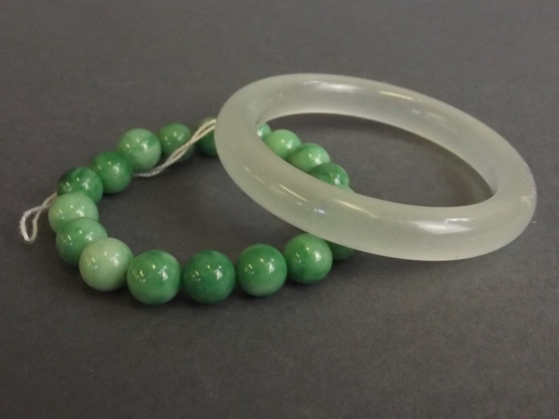 A marbled green jade beaded bracelet, and a jade (1 of 1)