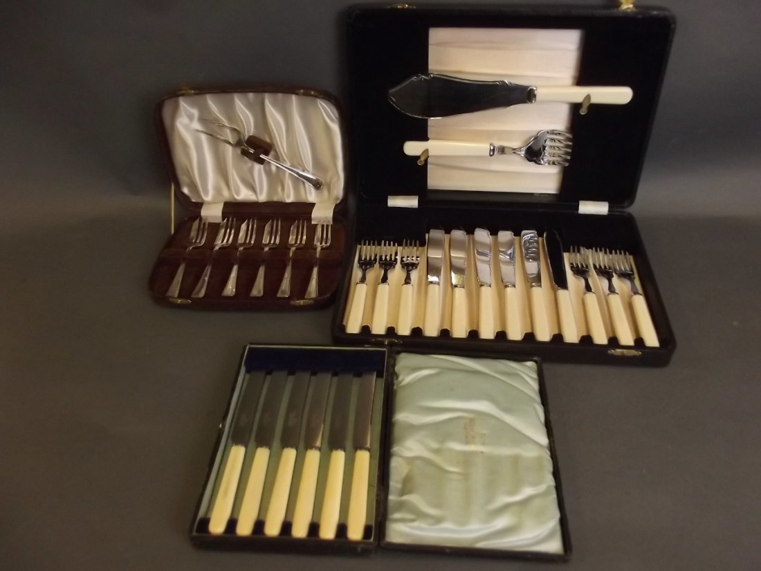 A boxed set of fish eaters and servers, a boxed set of: A boxed set of fish eaters and servers, a boxed set of pastry forks, and a boxed set of bone handled butter knives