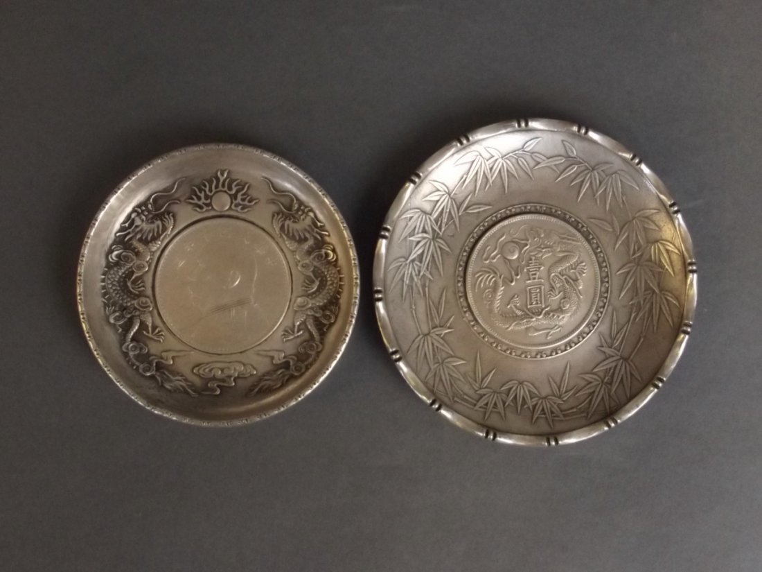 A Chinese white metal coin dish with bamboo decoration,: A Chinese white metal coin dish with bamboo decoration, and another, 3" diameter