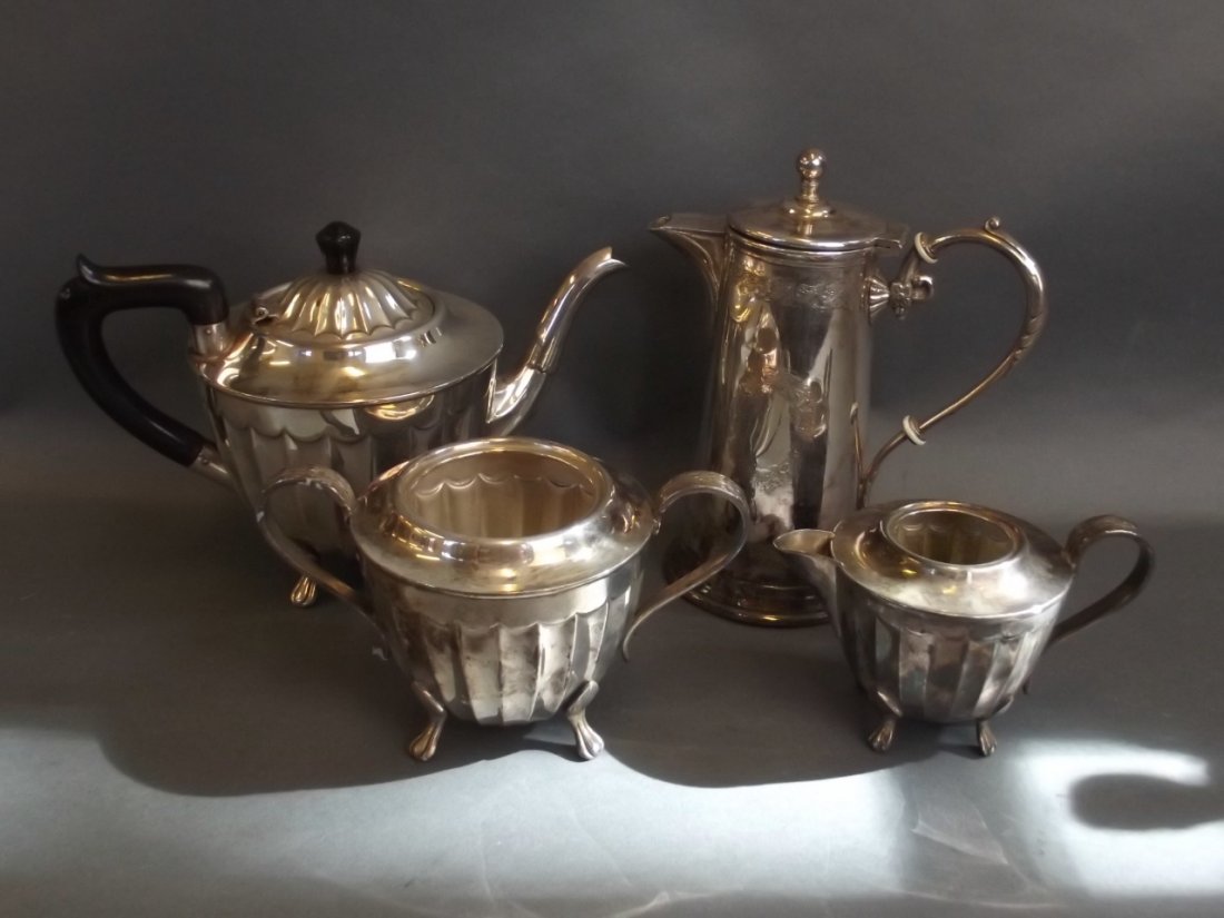 A silver plated three piece teaset, together with a (1 of 3)