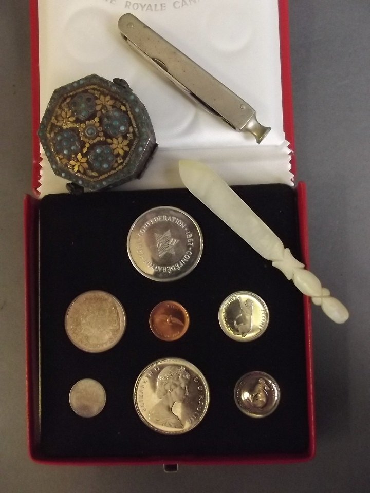 A Canadian century coin set 1867-1967, a Moorish: A Canadian century coin set 1867-1967, a Moorish bejewelled pill box, a Mother of Pearl paper knife, and a cigar smoker's pen knife