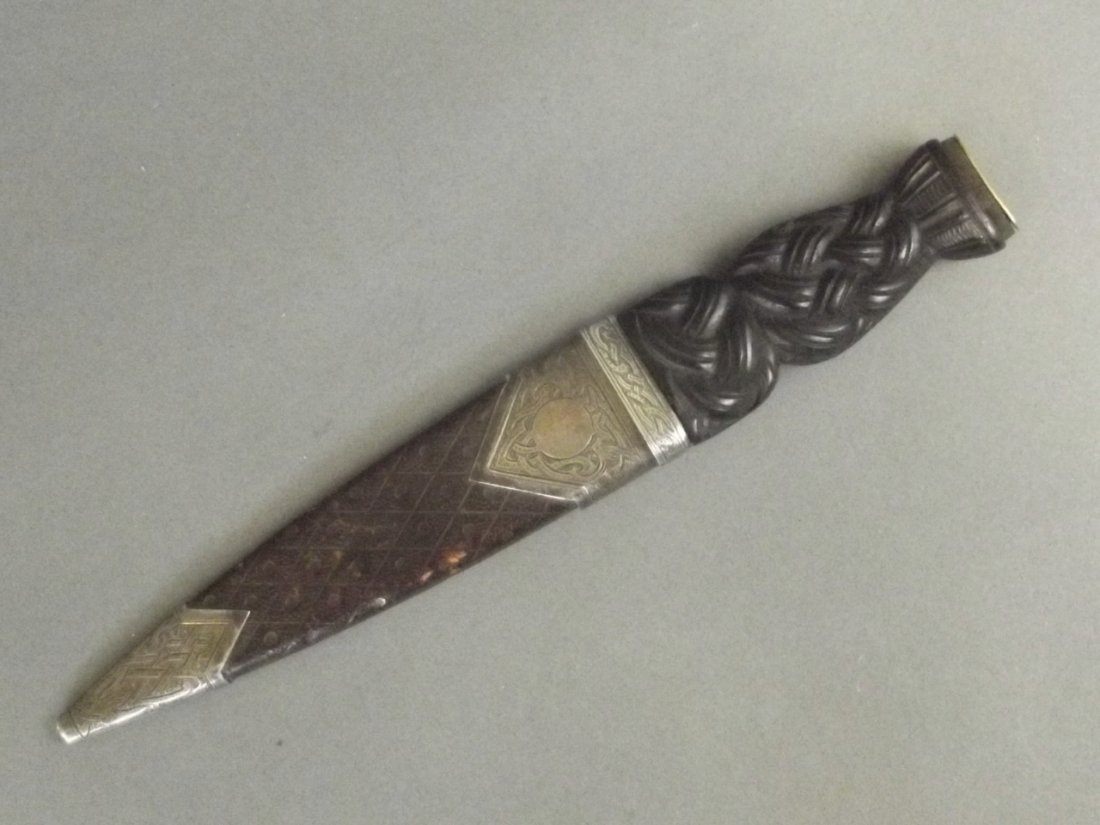 A sgian-dubh (Skean Dhu), the hardwood handle carved (1 of 3)