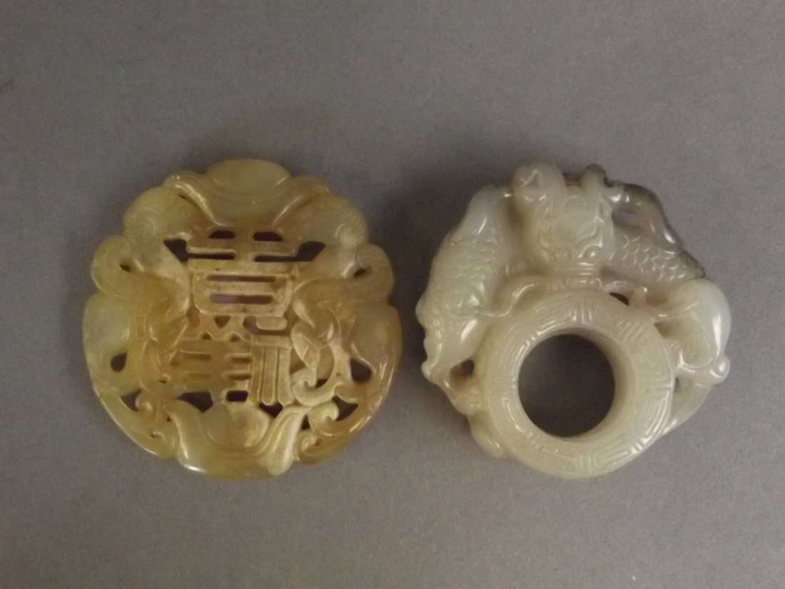 A Chinese grey jade archers ring with carved and (1 of 2)