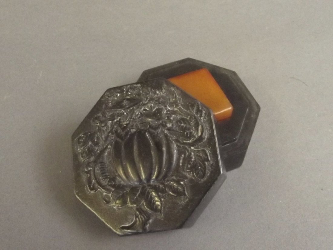 A Chinese amber soapstone seal in a spinach soapstone: A Chinese amber soapstone seal in a spinach soapstone box with carved gourd decoration to lid, 9 character inscription to base, 3" diameter