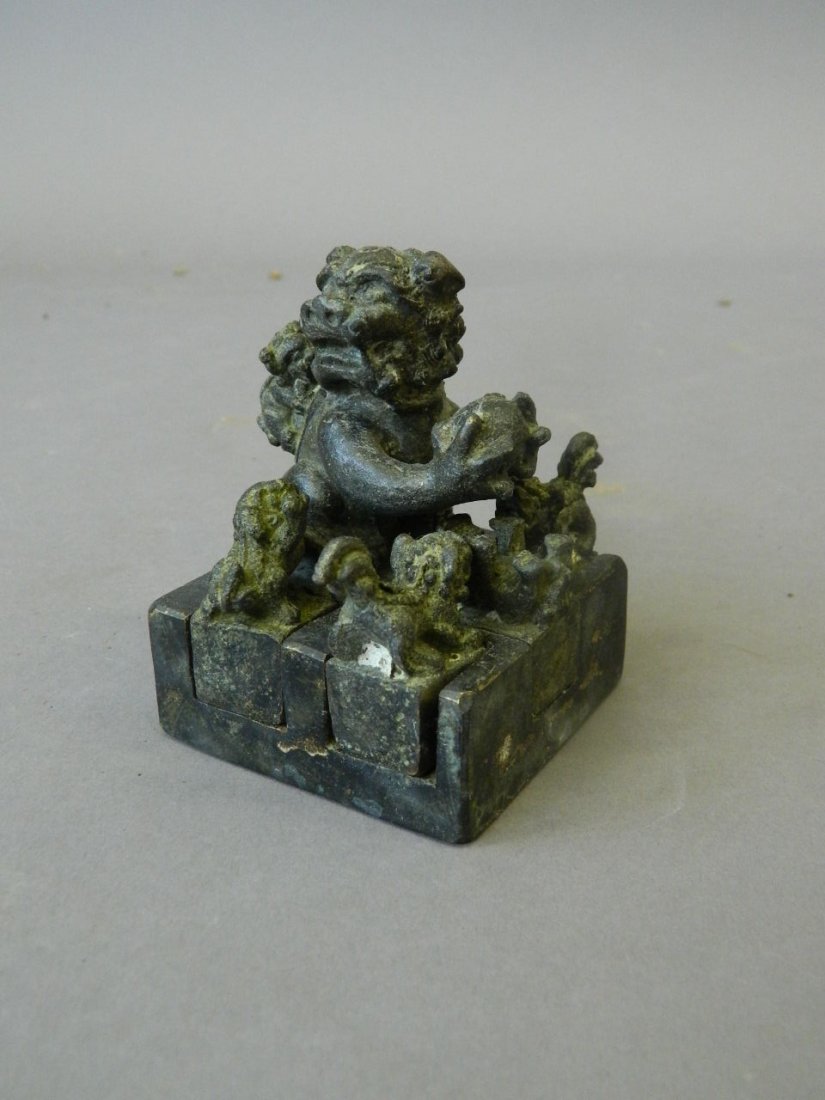 A Chinese bronze six part combination seal decoration (1 of 2)
