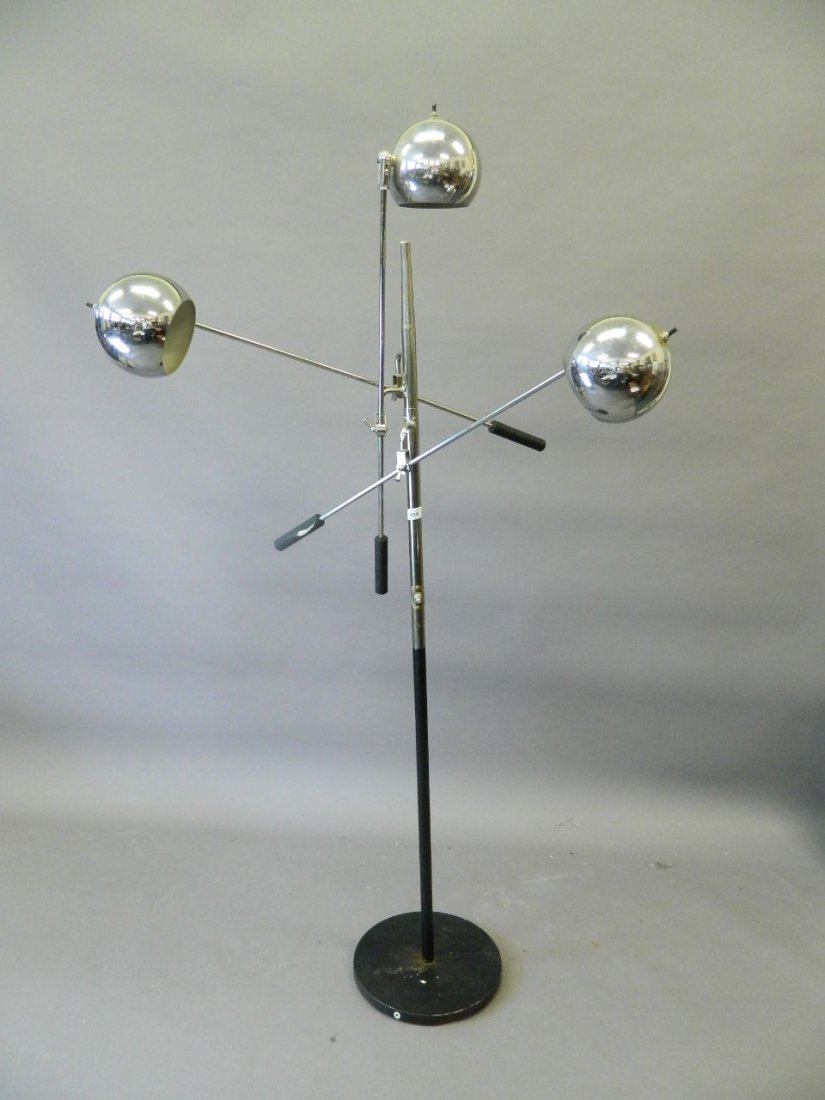 An Orbiter three branch floor lamp by Robert Sonneman,: An Orbiter three branch floor lamp by Robert Sonneman, 59" high