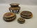 A Chinese hardwood vase stand with pierced frieze and