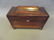 A Regency rosewood sarcophagus shaped tea caddy with