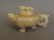 A Chinese carved marbled jade teapot with dragon handle