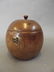 A fruitwood tea caddy in the form of an orange, 4½"