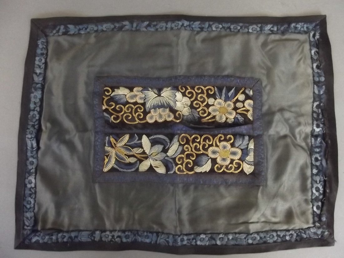 A Chinese silk embroidery with gilt thread depicting: A Chinese silk embroidery with gilt thread depicting lotus flowers, 11" x 15"