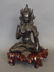 A North East Indian bronze figure of Buddha seated in