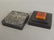 A Chinese spinach soapstone box with carved bat and