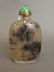 A Peking glass snuff bottle with reverse painted